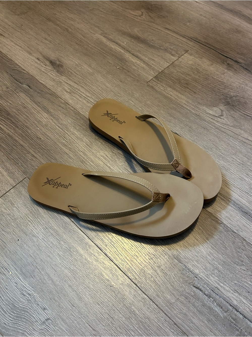 Brown flip flops